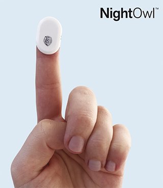 Resmed NightOwl home sleep apnea test is applied to an index finger that is raised.